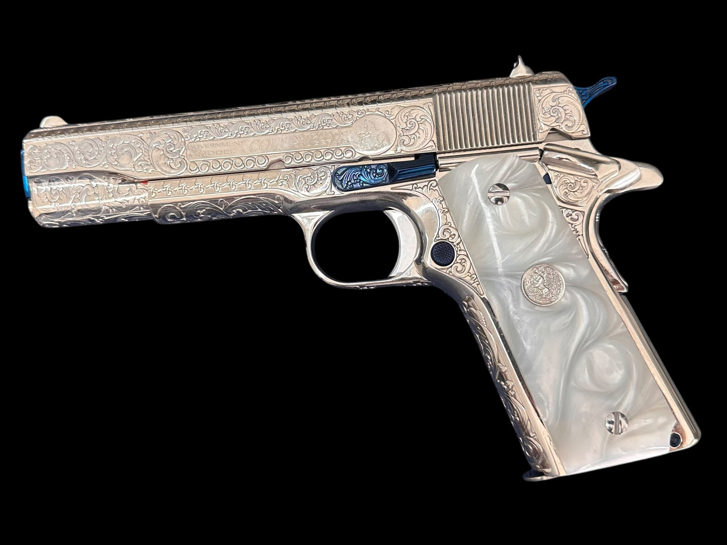 COLT CUSTOM 1911 HIGH POLISHED AND NICKEL PLATED WITH NITRO BLUE ACCENTS FULLY ENGRAVED .45ACP