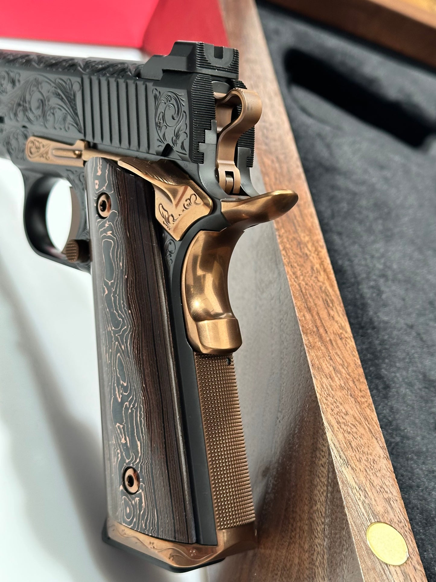 KINGS RIVER CUSTOM LEVEL III; CUSTOM WOOD DISPLAY CASE. HAND ENGRAVED POLISHED DLC/ COPPER FINISH .45ACP