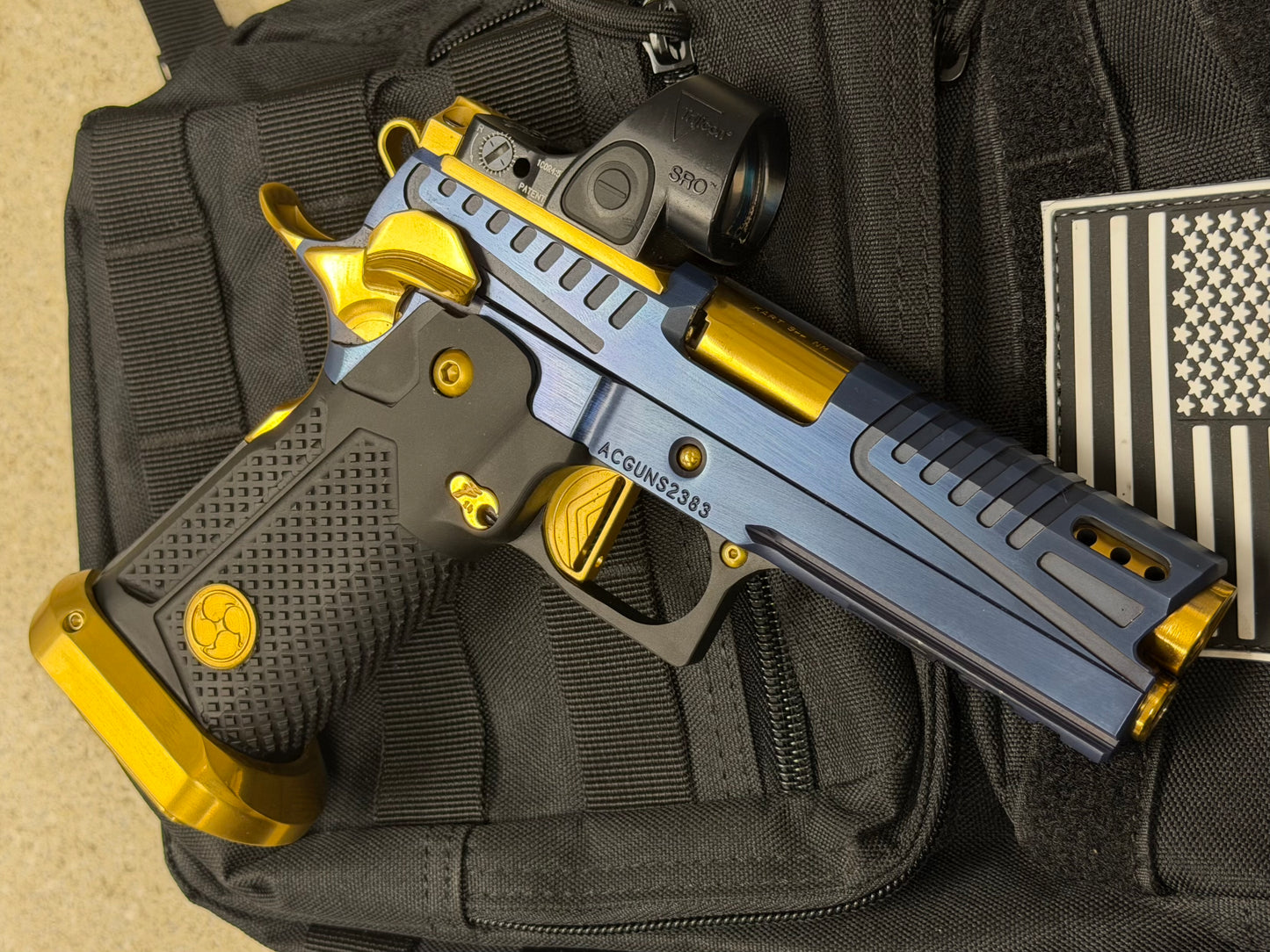 AKAI CUSTOM “DRAGON” PORTED LIMITED EDITION 1 OF 10 BLUE/ GOLD PVD FINISH WITH TRIJICON SRO 9MM (PRE OWNED)