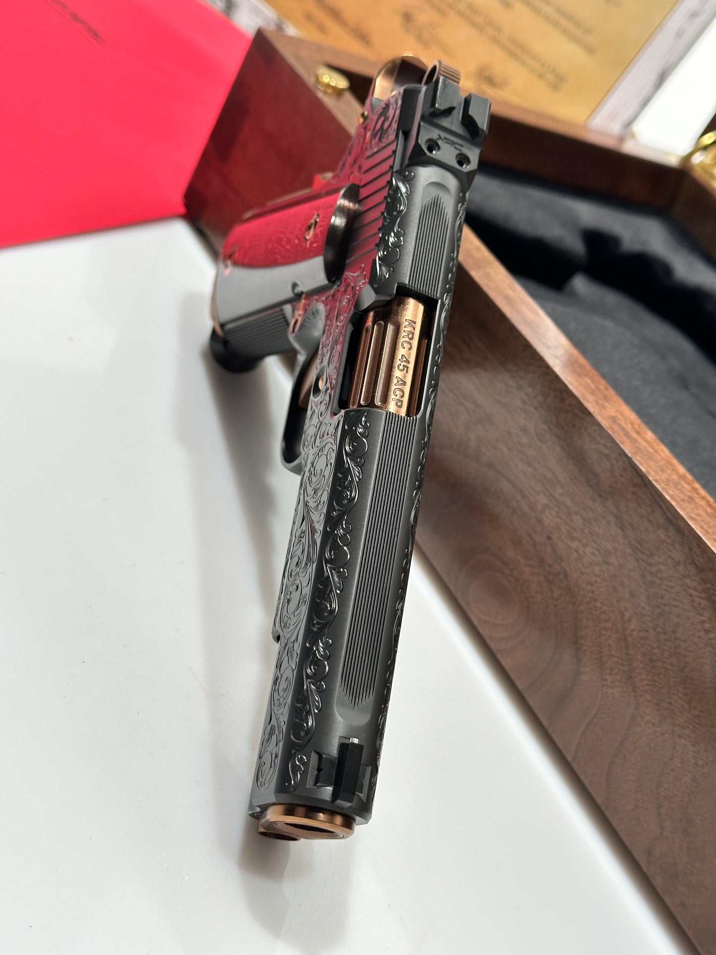 KINGS RIVER CUSTOM LEVEL III; CUSTOM WOOD DISPLAY CASE. HAND ENGRAVED POLISHED DLC/ COPPER FINISH .45ACP
