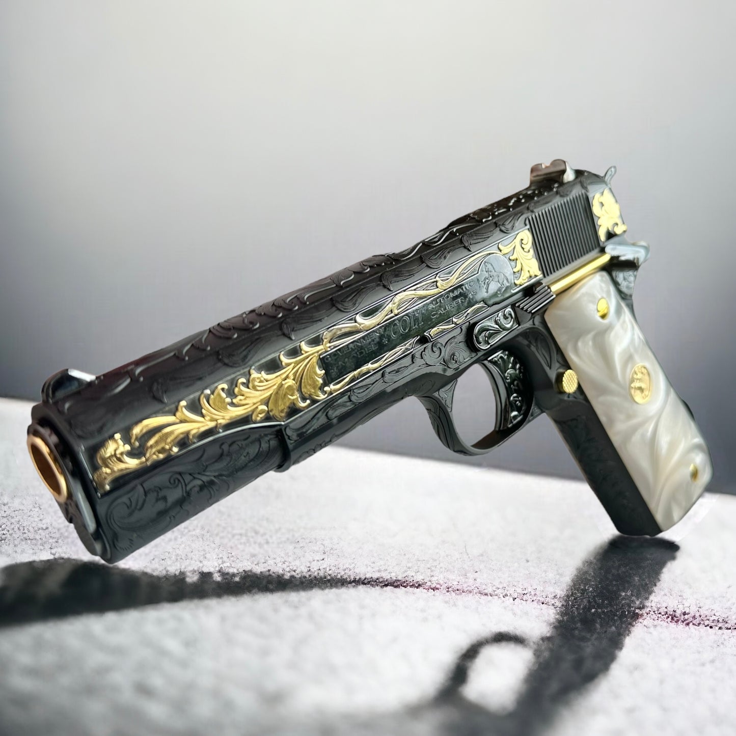 CUSTOM COLT 1911 GOVERNMENT FULLY ENGRAVED, BLUED WITH 24K GOLD PLATED ACCENTS