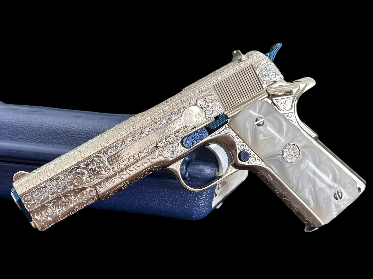 COLT CUSTOM 1911 HIGH POLISHED AND NICKEL PLATED WITH NITRO BLUE ACCENTS FULLY ENGRAVED .45ACP