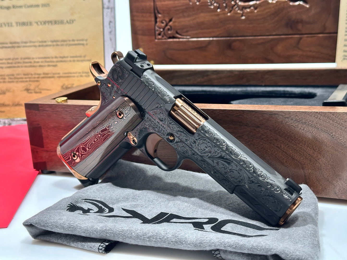 KINGS RIVER CUSTOM LEVEL III; CUSTOM WOOD DISPLAY CASE. HAND ENGRAVED POLISHED DLC/ COPPER FINISH .45ACP