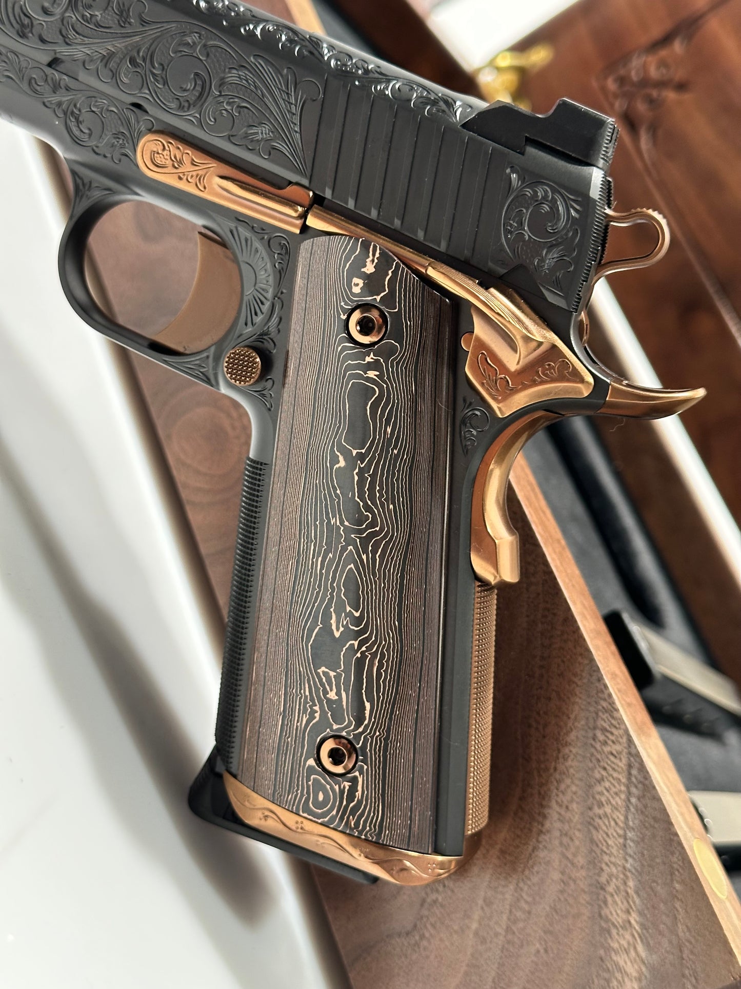 KINGS RIVER CUSTOM LEVEL III; CUSTOM WOOD DISPLAY CASE. HAND ENGRAVED POLISHED DLC/ COPPER FINISH .45ACP