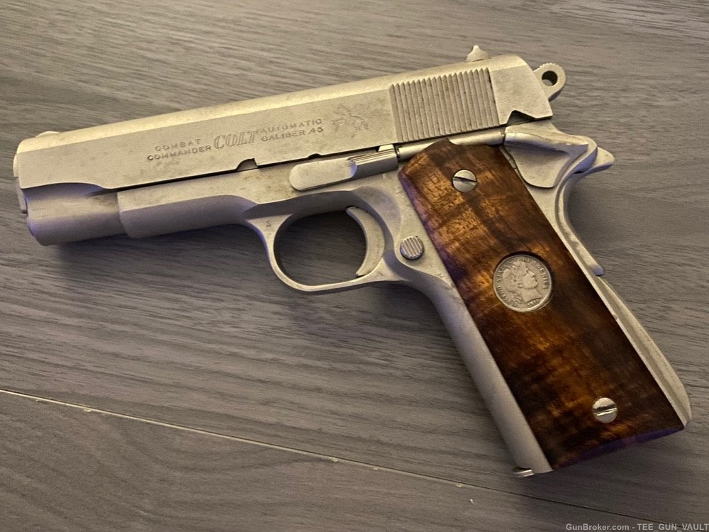 COLT 1911 COMBAT COMMANDER .45 AUTO WITH 2 GRIPS (NO CASE)