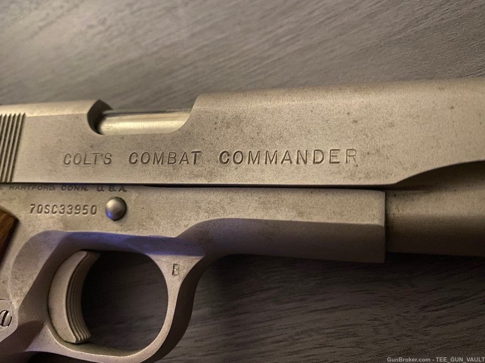 COLT 1911 COMBAT COMMANDER .45 AUTO WITH 2 GRIPS (NO CASE)