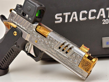 STACCATO CUSTOM XC “VITA FINITA” SILVER/COPPER WITH T7 GRIPS, TRIJICON RCR AND EDGE TRIGGER.