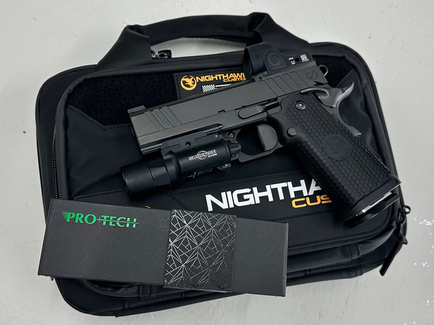 NIGHTHAWK CUSTOM TRS COMMANDER DOUBLE STACK 9MM WITH PRO TECH KNIFE SRO AND X300