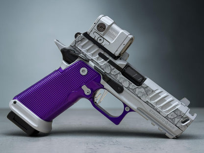 STACCATO CUSTOM P4X “ROCKS” ENGRAVED WITH EDGE TRIGGER, AL GRIPS AND AIMPOINT ACROSS P2