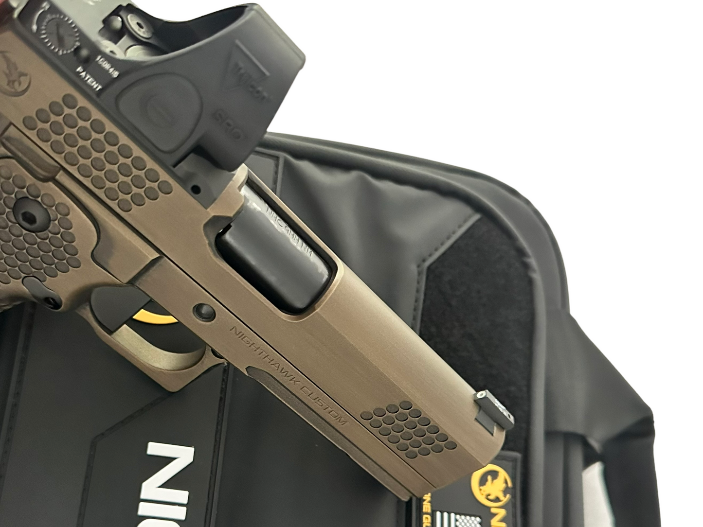 NIGHTHAWK CUSTOM TRS COMMANDER 4.25” BARREL TACTICAL READY SERIES 9MM IN BATTLE WORN BRONZE WITH TRIJICON SRO 2.5