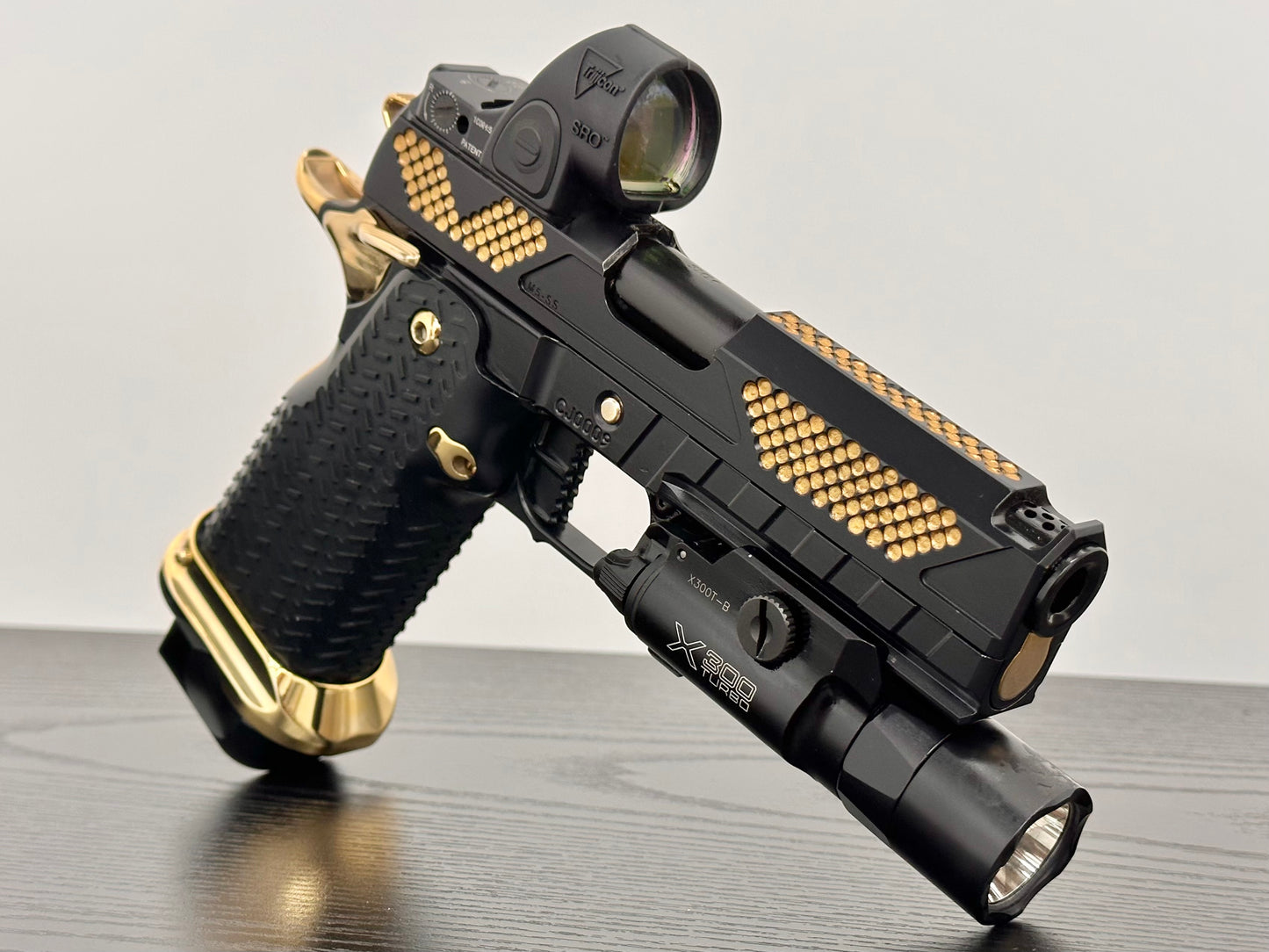 COMBAT PRECISION M5 CUSTOM 2011 PORTED WITH TRIJICON SRO & X300 9MM (Pre owned)