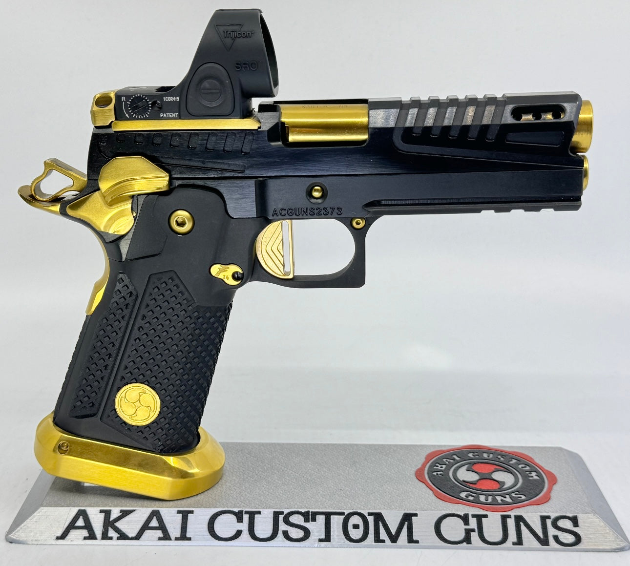 AKAI CUSTOM “DRAGON” PORTED LIMITED EDITION 1 OF 10 BLACK/ GOLD PVD FINISH WITH TRIJICON SRO 9MM