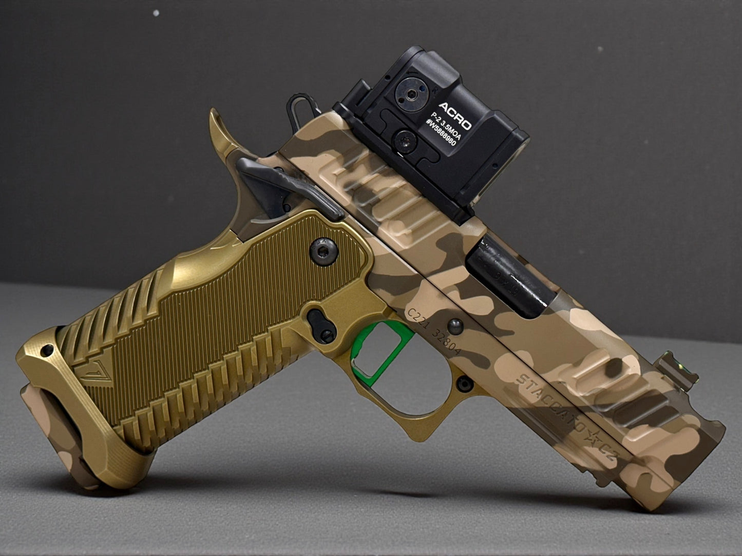 STACCATO CUSTOM C2 PORTED 3.9"
MULTICAM WITH T7 ALUMINUM GRIPS, AIMPOINT ACRO P2 & INFINITY "GREEN" TRIGGER