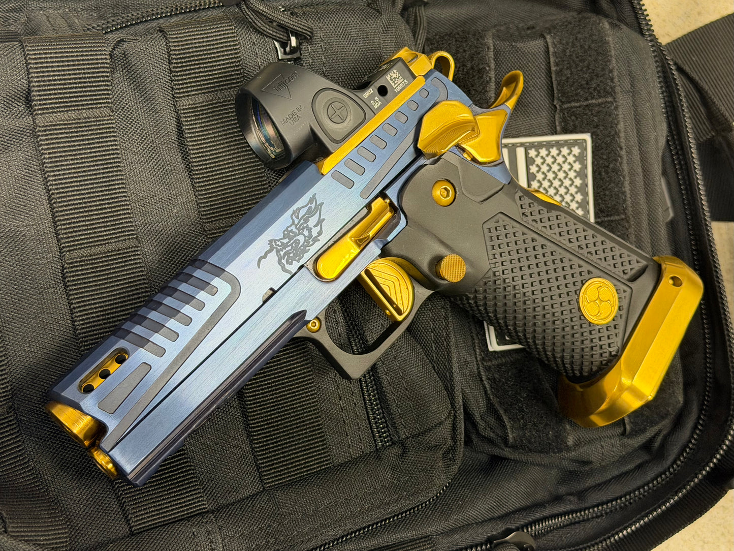 AKAI CUSTOM “DRAGON” PORTED LIMITED EDITION 1 OF 10 BLUE/ GOLD PVD FINISH WITH TRIJICON SRO 9MM (PRE OWNED)