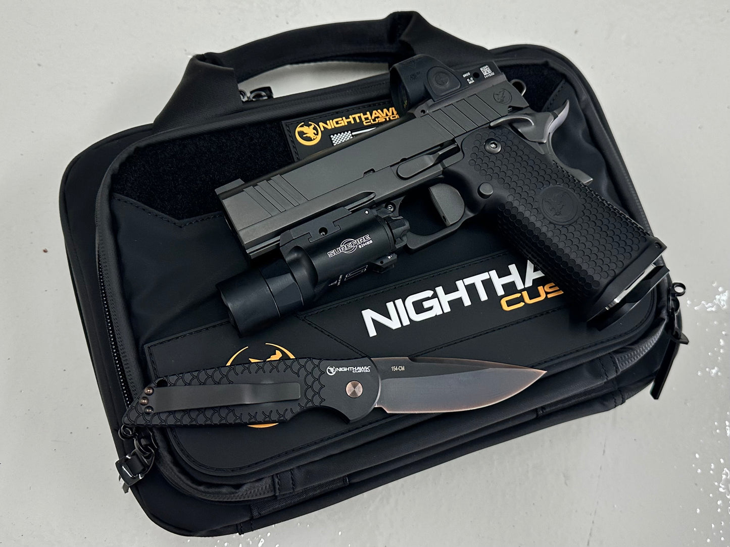 NIGHTHAWK CUSTOM TRS COMMANDER DOUBLE STACK 9MM WITH PRO TECH KNIFE SRO AND X300