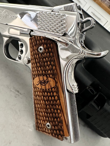 Kimber 1911 Stainless Raptor II .45 acp high polished mirror finish (pre-owned)
