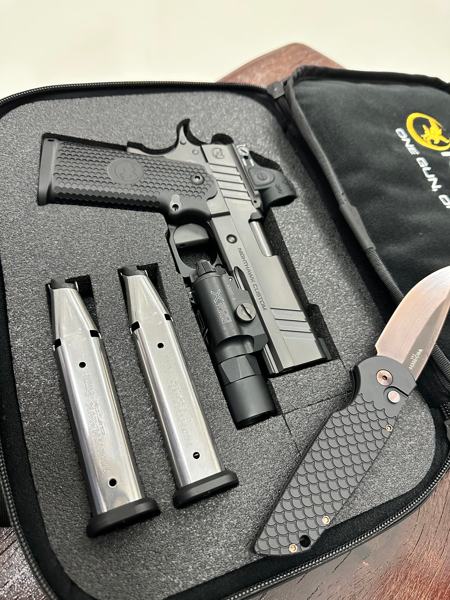 NIGHTHAWK CUSTOM TRS COMMANDER DOUBLE STACK 9MM WITH PRO TECH KNIFE SRO AND X300