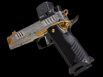STACCATO CUSTOM XC “VITA FINITA” SILVER/COPPER WITH T7 GRIPS, TRIJICON RCR AND EDGE TRIGGER.