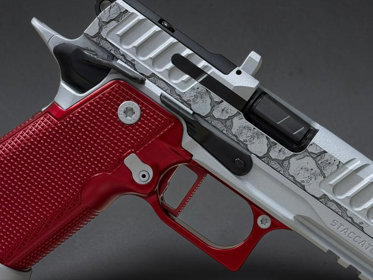 STACCATO CUSTOM P4X “ROCKS” COMPENSATED WITH RED ANODIZED ALUMINUM GRIPS AND INFINITY TRIGGER