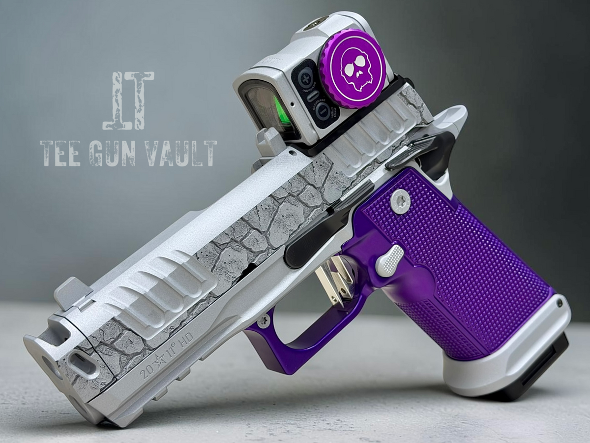 STACCATO CUSTOM P4X “ROCKS” ENGRAVED WITH EDGE TRIGGER, AL GRIPS AND AIMPOINT ACROSS P2