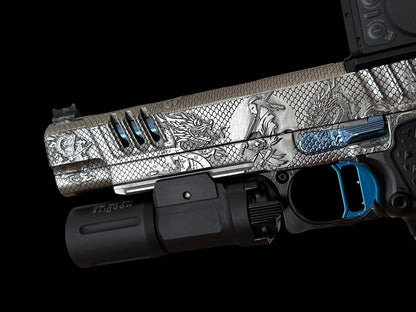 STACCATO CUSTOM XL “LAST SAMURAI” FULLY ENGRAVED PORTED IN SILVER/BLUE POLISHED PVD FINISH. ATLAS GRIPS AND TRIGGER