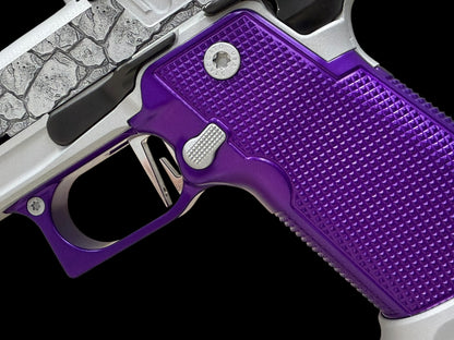 STACCATO CUSTOM P4X “ROCKS” ENGRAVED WITH EDGE TRIGGER, AL GRIPS AND AIMPOINT ACROSS P2