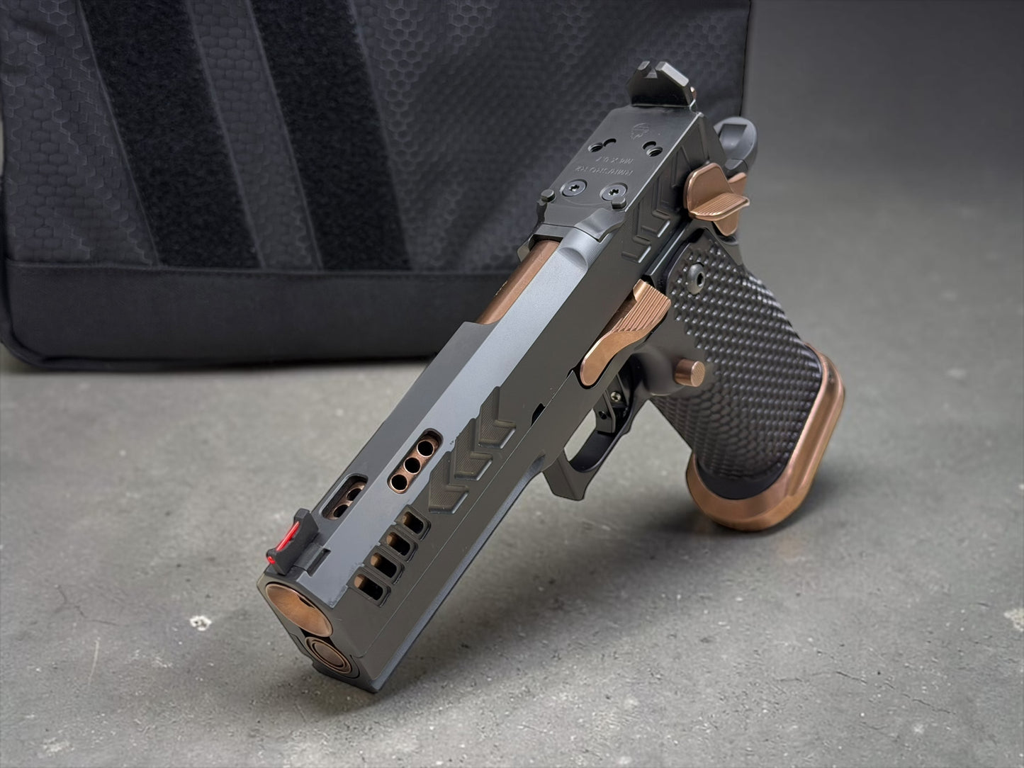 CNC GUNWORKS AKIRA PORTED 4.6”9MM  OPTIC READY IN BLACK DLC WITH ROSE GOLD BARREL AND PARTS.