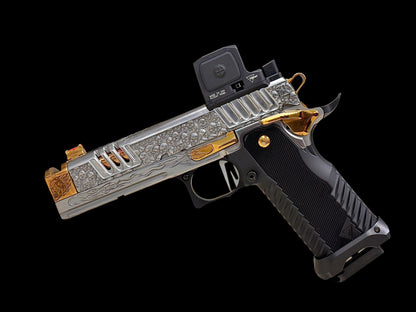 STACCATO CUSTOM XC “VITA FINITA” SILVER/COPPER WITH T7 GRIPS, TRIJICON RCR AND EDGE TRIGGER.