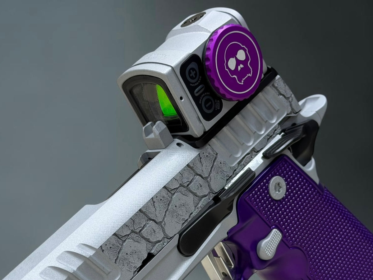 STACCATO CUSTOM P4X “ROCKS” ENGRAVED WITH EDGE TRIGGER, AL GRIPS AND AIMPOINT ACROSS P2