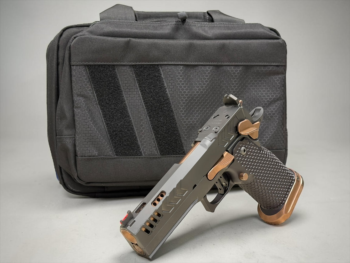 CNC GUNWORKS AKIRA PORTED 4.6”9MM  OPTIC READY IN BLACK DLC WITH ROSE GOLD BARREL AND PARTS.