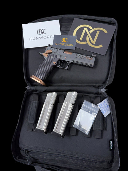 CNC GUNWORKS AKIRA PORTED 4.6”9MM  OPTIC READY IN BLACK DLC WITH ROSE GOLD BARREL AND PARTS.