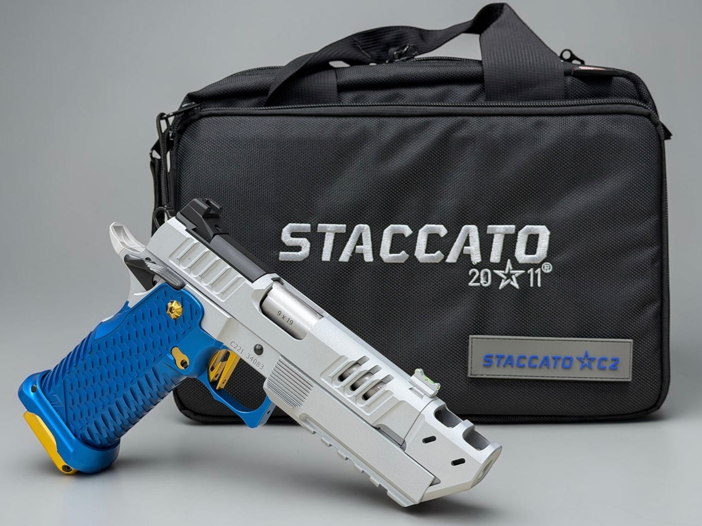 STACCATO C2 C SERIES CUSTOM COMPENSATED SILVER WITH BLUE T7 ALUMINUM GRIPS AND EDGE TRIGGER