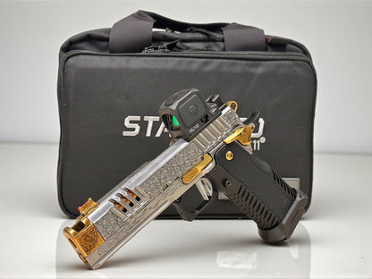 STACCATO CUSTOM XC “VITA FINITA” SILVER/COPPER WITH T7 GRIPS, TRIJICON RCR AND EDGE TRIGGER.