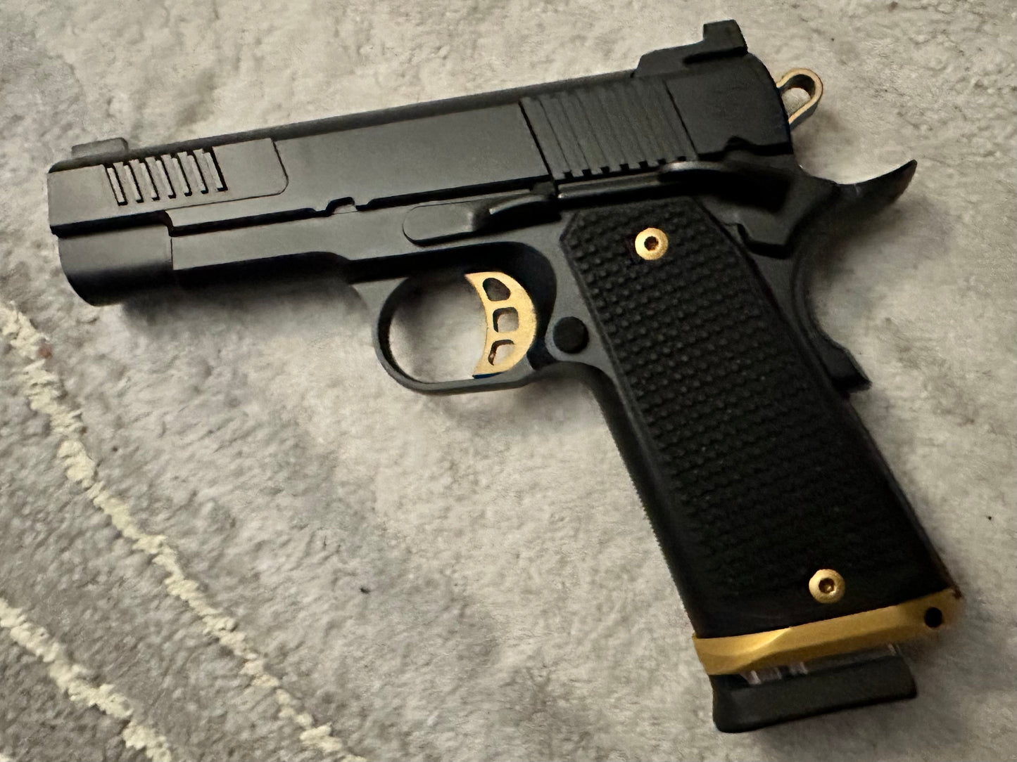 NIGHTHAWK CUSTOM DELEGATE 9MM BLACK/GOLD WITH MAMMOTH IVORY GRIPS.